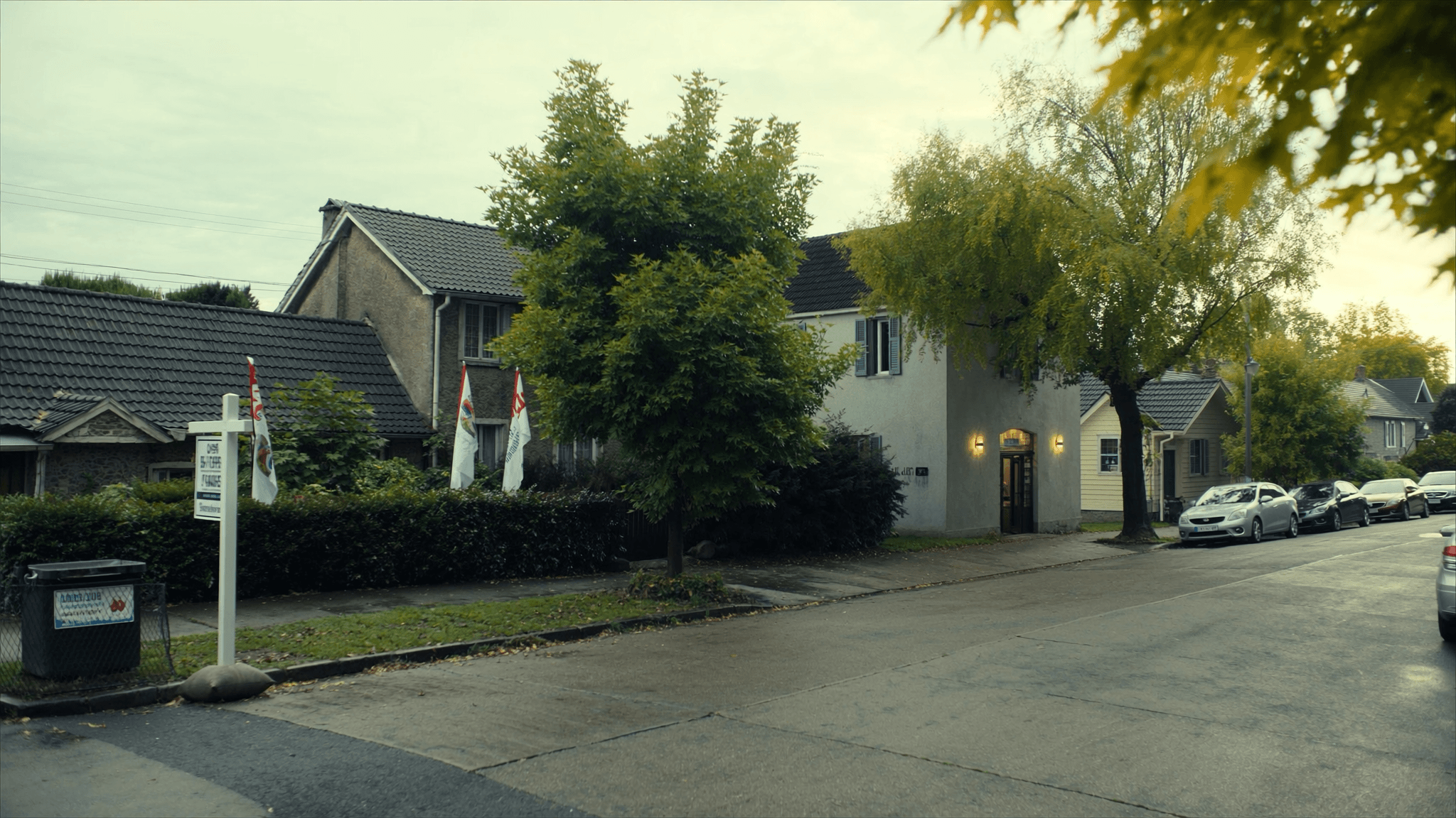 US residential street with an open-house sign